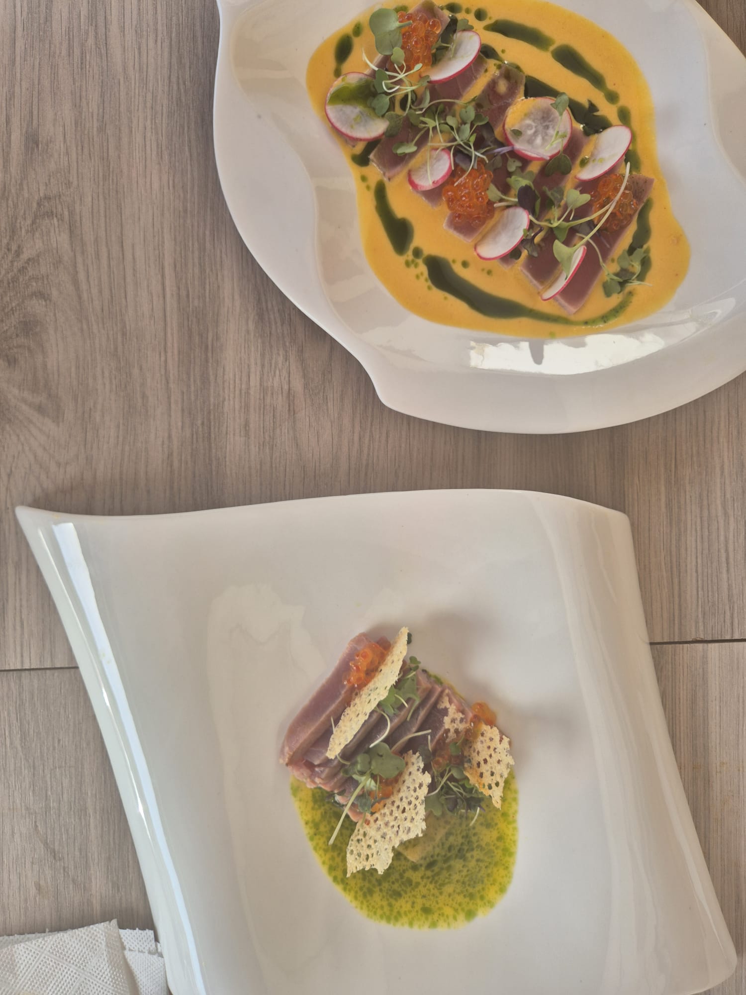 Two El Nido dishes at the table
